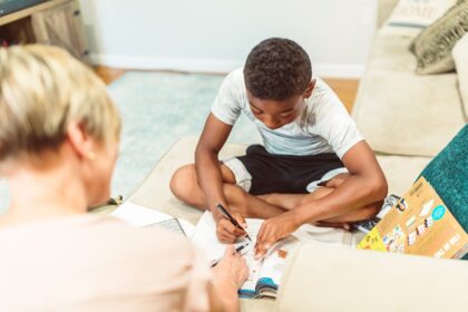 a-boy-answering-a-book